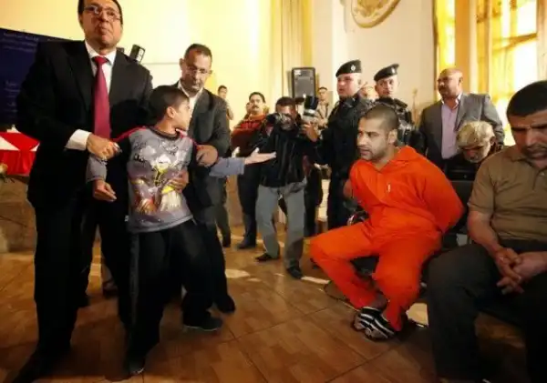 Moment a child confronts the terrorist who killed his father