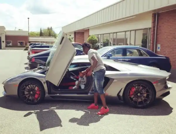 Photo: Obafemi Martins & Son Pose With Super Car