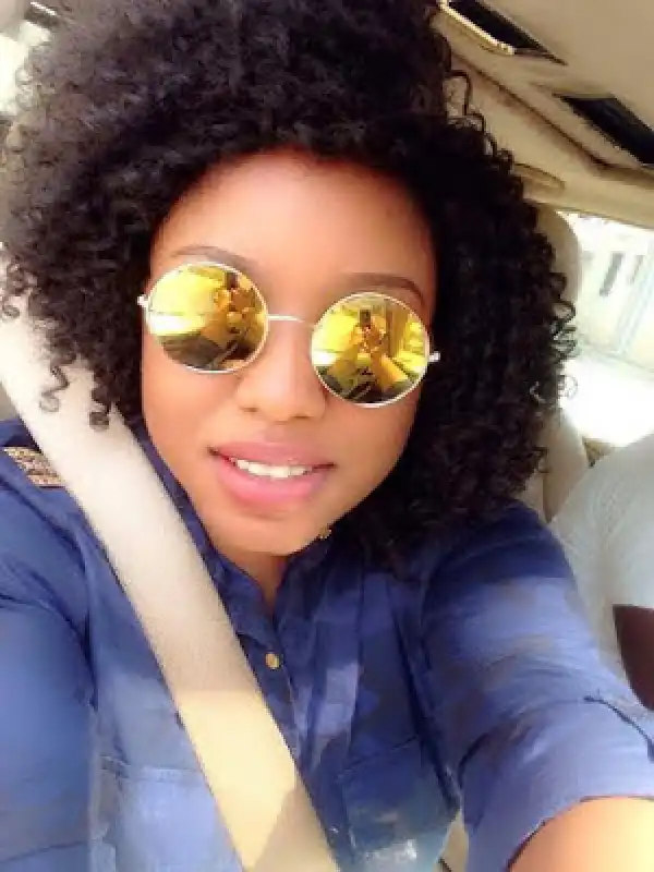 See Lady That Lady Says She Looks Like Rita Dominic