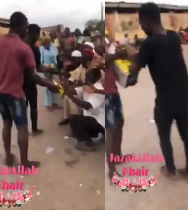 Residents distribute COVID19 palliatives carted away from a warehouse to beggars (video)