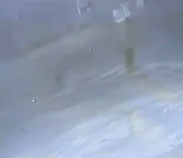 Suspected Diabolic Man Spotted in a CCTV Footage Engaging in a Ritual In The Middle of The Night (video)