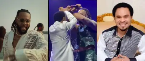 Fans React As Flavour And Odumeje Show Unusual Hand Sign On Stage