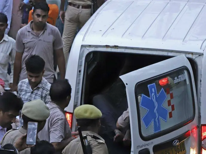 Six dead, scores injured in India temple stampede