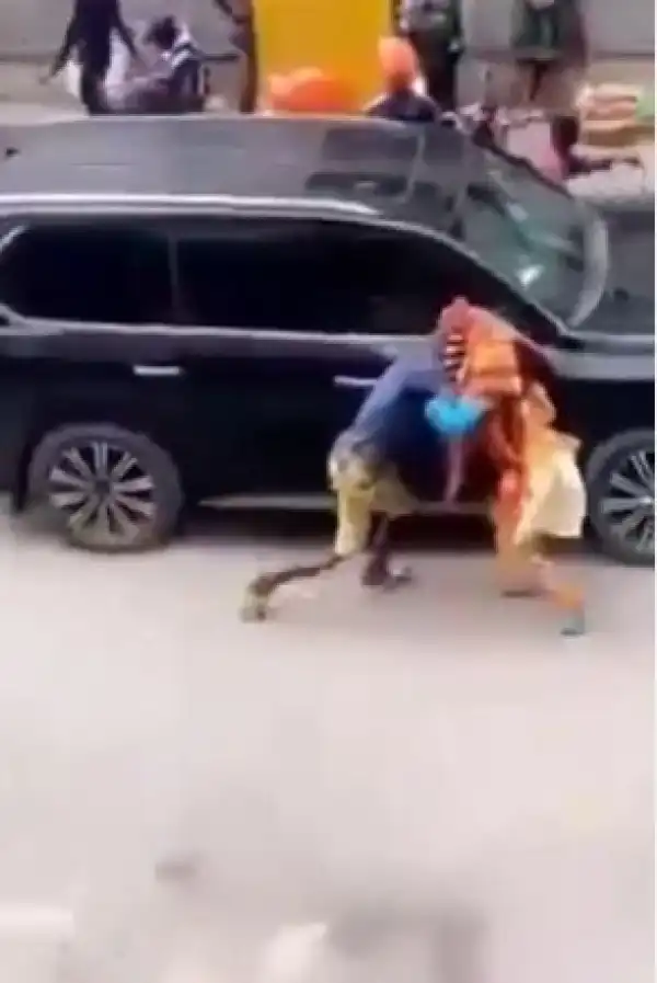 Drama As Man Is Seen Headbutting A Masquerade In Lagos (Video)