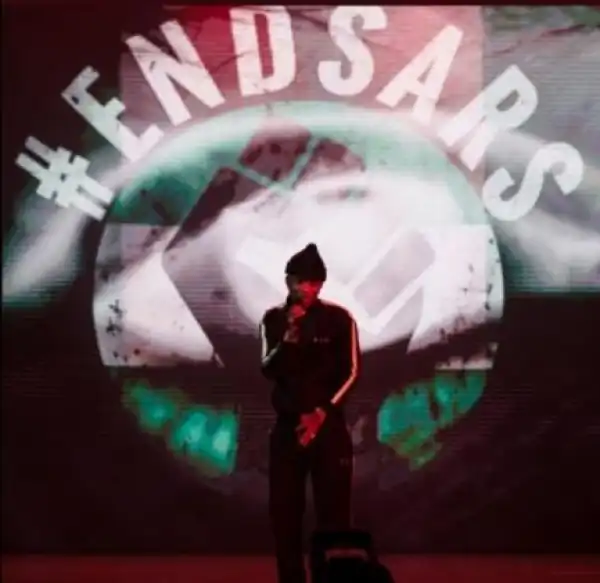 #EndSARS protester inks tattoo of Lekki shooting on his body