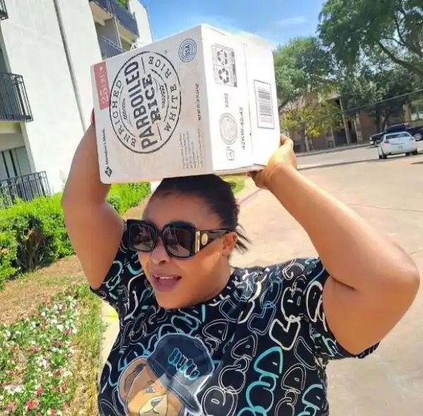 America Will Level You - Actress Dayo Amusa Laments Over Absence Of A Helper As She Carries Rice On Her Head