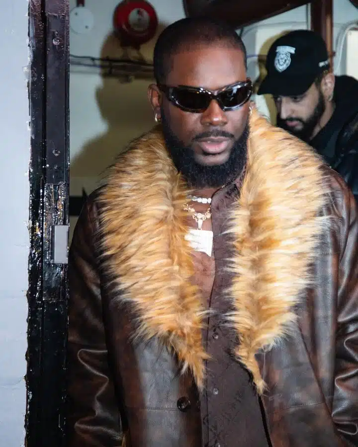 Adekunle Gold rates Timi Dakolo’s song, ‘Great Nation’ over reinstated national anthem