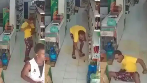 CCTV Captures Moment Thief Accidentally Broke Bottle Of Wine While Trying To Sneak It Out Of A Store (Video)