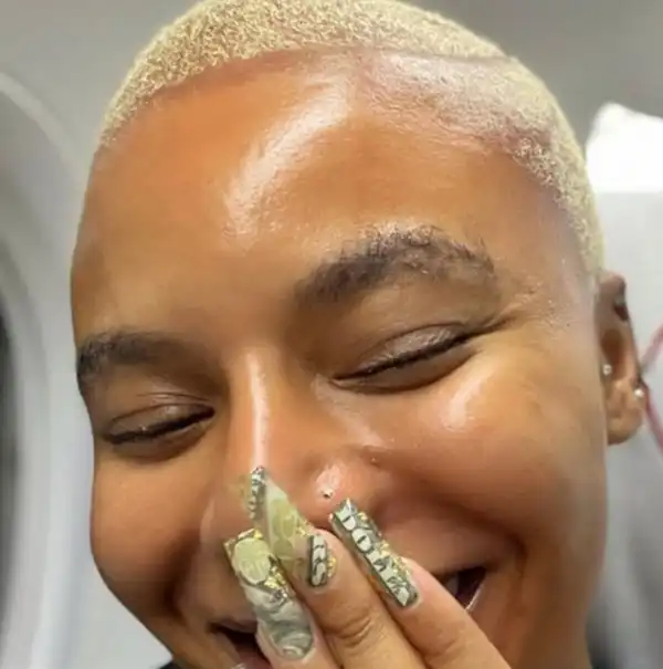 Actress Nancy Isime Fixes Nails With Dollar Bills (Video)