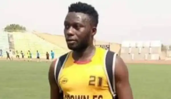 Nigerian Footballer Slumps During Football Match