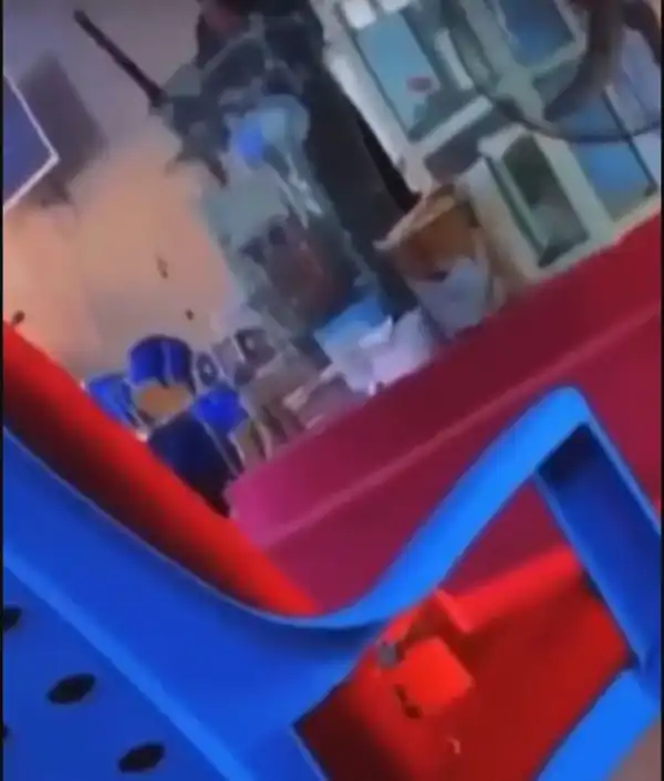 Nigerian Pastor Shows Up In Church With A Gun (Video)