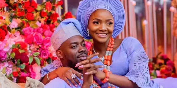 Adekunle Gold responds as man prays for his wife Simi to break his heart