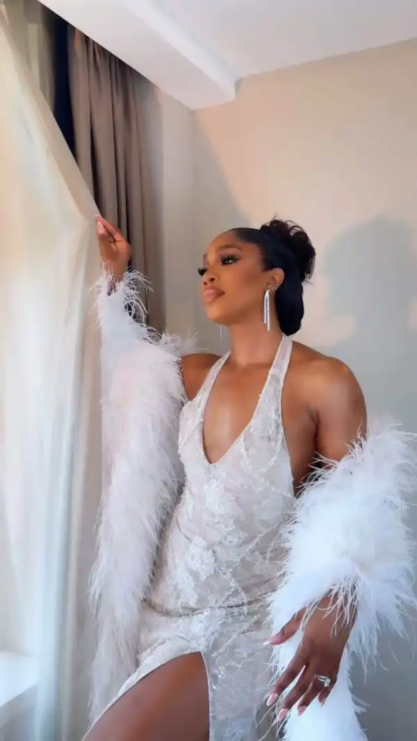 Romantic moment Sharon Ooja read vows to husband at white wedding