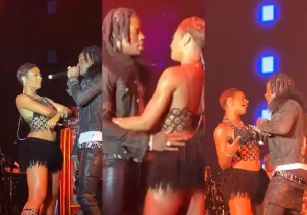 On-stage affection between Rema and Ayra Starr as they share intense gaze and heartfelt hug