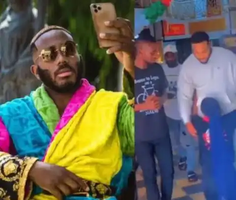 Drama As Excited Fan Goes On Her Knees To Greet Kiddwaya Inside A Shopping Mall (Video)