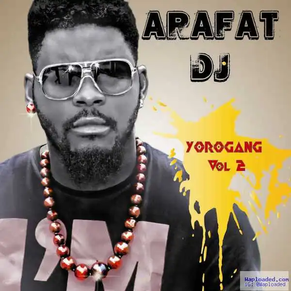 DJ Arafat slams and stumps on a fan on stage