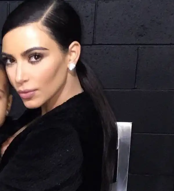 Fans slam Kim Kardashian for cropping daughter off selfie