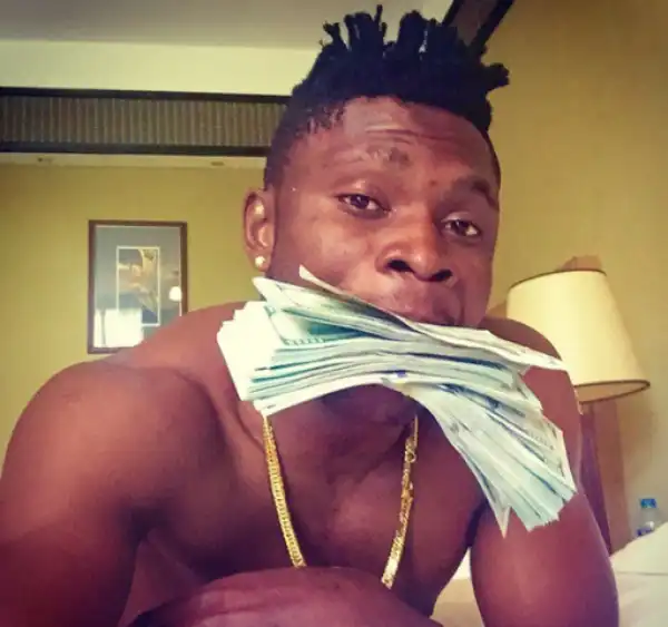 Footballer Aaron Samuel Poses With Wads Of Dollar Bills