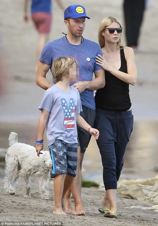 Gywneth Paltrow & Chris Martin walk arm-in arm as they spend Val with their kids
