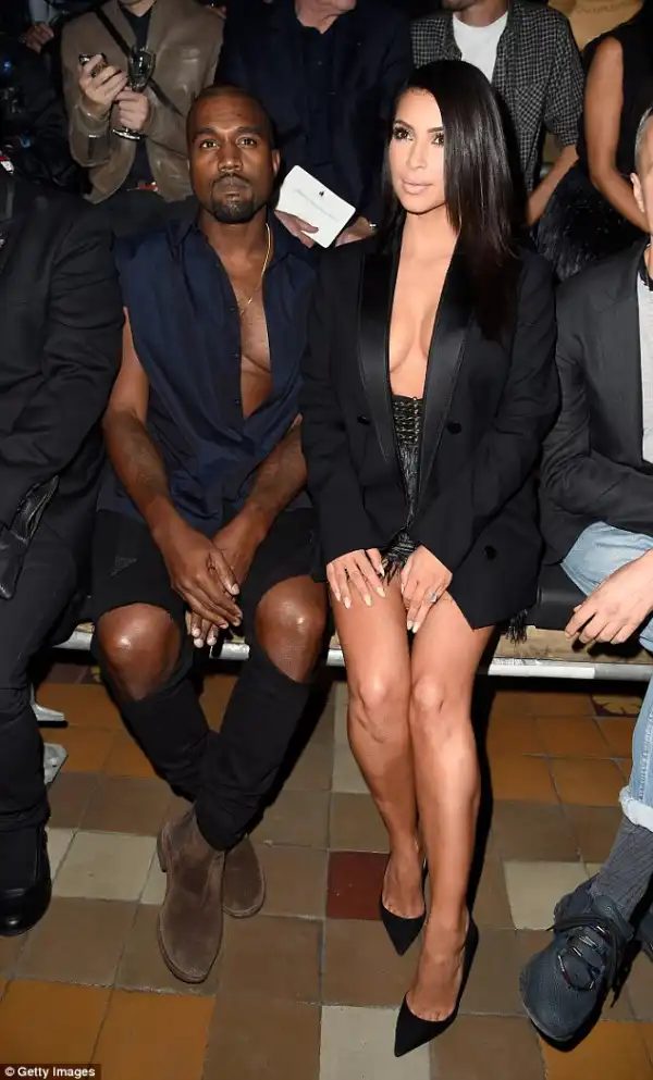 Kim Kardasian and Kanye West Both Show Off Their Cleavages