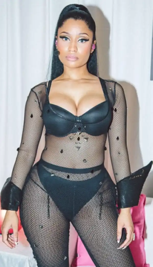 Nicki Minaj shows off curves in sheer performance outfit
