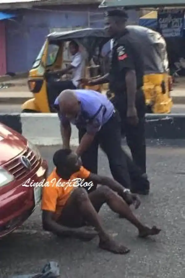 Okadaman loses his trousers & exposes himself after police arrest