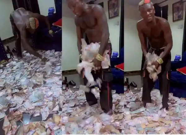 Singer, Portable Flaunts Huge Cash Sprayed On Him By Fans (Video)