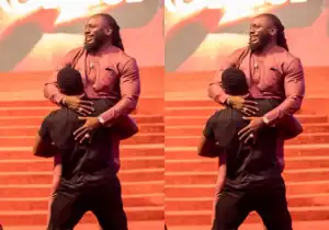 Tobe Bakre causes buzz for lifting Pastor Jimmy Odukoya on church altar