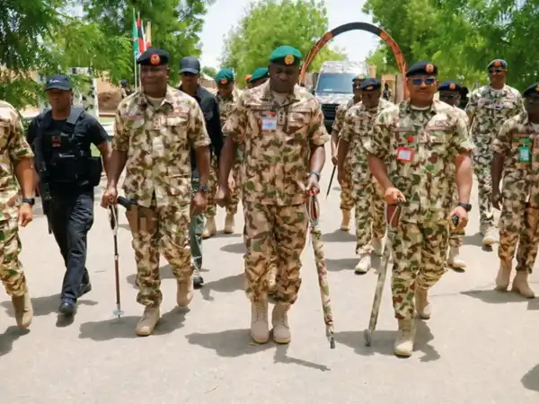 Troops arrest suspected bandit in military camouflage, weapons