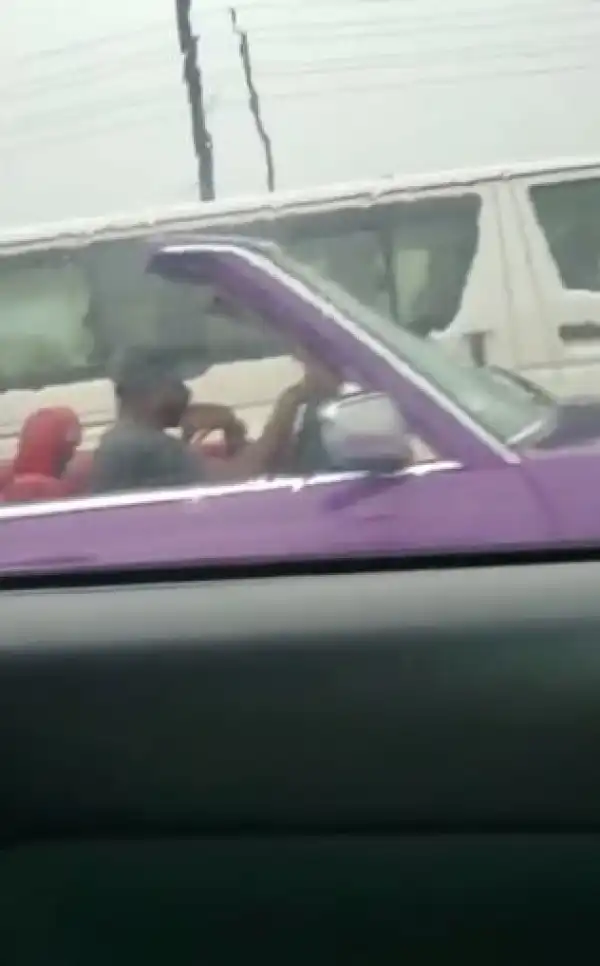 The Moment A Man Driving A Convertible Got Drenched In The Rain (Video)