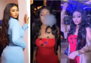 Video As Regina Daniels Reveals Her Wild Side, Puffs Smoke At A Nightclub Overseas