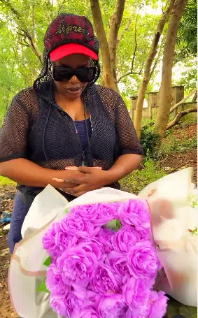 Empress Njamah visits Ada Ameh’s graveside with flowers on 2nd anniversary of her demise