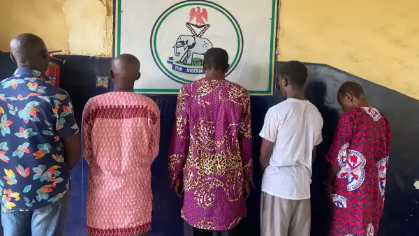 Five arrested for allegedly assaulting woman who assisted police investigation