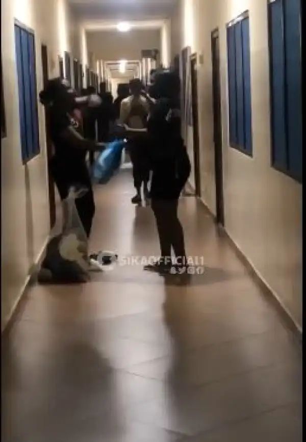 Drama As Two Female Students Exchange Blows Over Boyfriend After Bumping Into Each Other In His Room (Video)