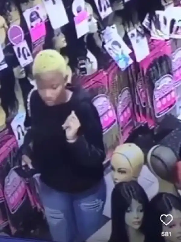 Young Lady Caught Stealing Wig From Store (Video)