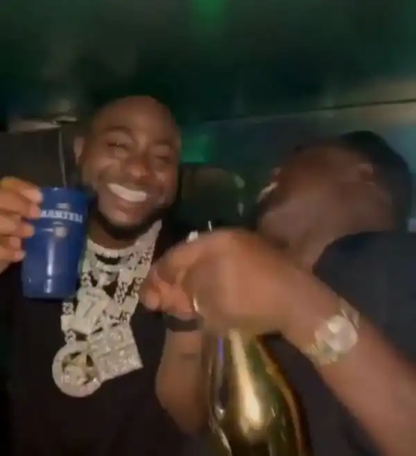Davido Hangs Out With Obi Cubana, Drinks Wine That Cost N400k A Bottle (Video)
