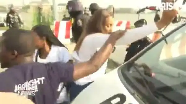 Arise TV Crew Covering The #EndSARS Protest Memorial Harassed By Police Officials Who Also Tried To Seize Their Drone (Video)