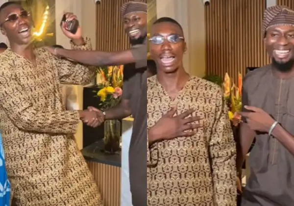 “Above the law” -Moment comedian, Layi Wasabi meets a man taller than him at an event