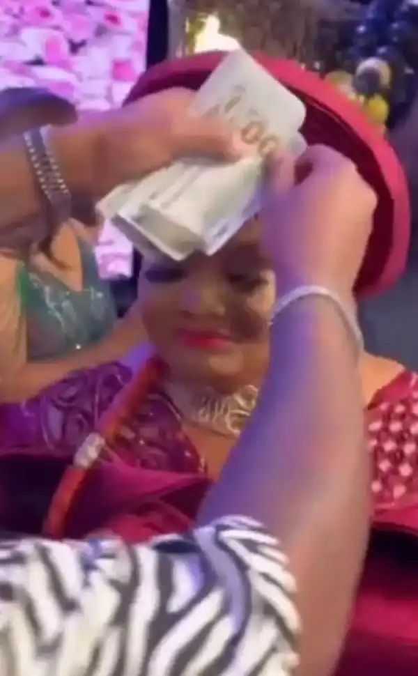 Davido Sprays $100 Bills Nonstop On Woman At A Party (Video)