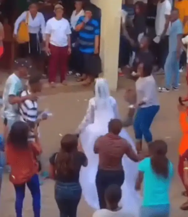 Moment Bride Arrives School in Wedding Gown to Write Her Final Exam